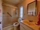 Full bathroom with walk-in shower and bright lighting at 2055 S Floral Ave # 73, Bartow, FL 33830