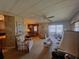 Bright living room with a dining area and sliding glass doors at 2055 S Floral Ave # 73, Bartow, FL 33830