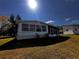 Sunroom with screen windows, offering relaxing outdoor views at 2055 S Floral Ave # 73, Bartow, FL 33830