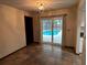 Dining area with tile floors and sliding doors to the pool at 2062 Katie Ct, Winter Haven, FL 33884