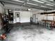 Attached garage with ample space and workbench at 2062 Katie Ct, Winter Haven, FL 33884