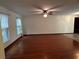 Living room with hardwood floors and ceiling fan at 2062 Katie Ct, Winter Haven, FL 33884