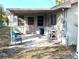 Back patio with concrete flooring and exterior sink at 217 Bay E St, Davenport, FL 33837