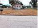 House exterior with a yard and street view at 217 Bay E St, Davenport, FL 33837