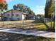 Ranch home with a fenced backyard and shed at 217 Bay E St, Davenport, FL 33837