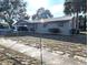 House exterior view with driveway and front yard at 217 Bay E St, Davenport, FL 33837