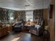 Cozy living room featuring two recliners and tiled floors at 217 Bay E St, Davenport, FL 33837