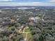 Aerial view of home and surrounding neighborhood at 3703 White Oak Ct, Lake Wales, FL 33898