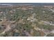 Aerial view showing home's location in a quiet residential neighborhood at 3703 White Oak Ct, Lake Wales, FL 33898