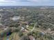 Aerial view showing home's location in a quiet residential neighborhood at 3703 White Oak Ct, Lake Wales, FL 33898