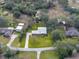 Aerial view of single Gathering home with a large yard at 3703 White Oak Ct, Lake Wales, FL 33898