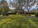 Large backyard with shed and mature trees at 3703 White Oak Ct, Lake Wales, FL 33898