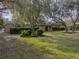 Large backyard with shed and mature trees at 3703 White Oak Ct, Lake Wales, FL 33898