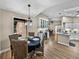 Bright dining area with four chairs and a view to the kitchen at 3703 White Oak Ct, Lake Wales, FL 33898