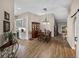 Dining room with wood floor and a farmhouse style hutch at 3703 White Oak Ct, Lake Wales, FL 33898