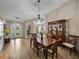 Dining area with wood floors and a wooden table at 3703 White Oak Ct, Lake Wales, FL 33898