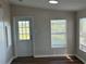 Bright room featuring a door to the outside and a window allowing ample light at 4128 W Bella Vista St, Lakeland, FL 33810