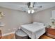 Bedroom showcasing a ceiling fan, neutral paint, and light-colored floors at 4523 Hallamview Ln, Lakeland, FL 33813