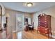 Bedroom featuring a built-in vanity, natural light, and hardwood floors at 4523 Hallamview Ln, Lakeland, FL 33813