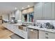 Bright kitchen with white cabinets, stainless steel appliances, and a farmhouse sink at 4523 Hallamview Ln, Lakeland, FL 33813