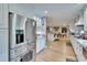 Spacious kitchen with stainless steel refrigerator, center island, and bright, modern design at 4523 Hallamview Ln, Lakeland, FL 33813