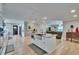 Open-concept kitchen featuring an island with sink, granite countertops, and stainless steel appliances at 4523 Hallamview Ln, Lakeland, FL 33813