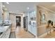 Stylish kitchen featuring stainless steel appliances, white cabinets, and granite counters at 4523 Hallamview Ln, Lakeland, FL 33813