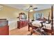 Comfortable main bedroom with ceiling fan and light wood floors at 4523 Hallamview Ln, Lakeland, FL 33813