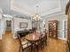 Elegant dining room with hardwood floors and chandelier at 465 Rowland Ct, Bartow, FL 33830