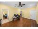 Home office with hardwood floors and access to a bedroom and other rooms at 465 Rowland Ct, Bartow, FL 33830