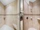 Large walk-in shower with tiled walls and built-in seat at 465 Rowland Ct, Bartow, FL 33830