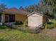 Yard with storage shed and black metal fence at 465 Rowland Ct, Bartow, FL 33830