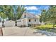 Back of house featuring an exterior shed and concrete driveway at 520 E Stanford St, Bartow, FL 33830