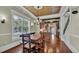 The Dining Room features vintage ceiling, chandelier, hardwood floors and large windows at 520 E Stanford St, Bartow, FL 33830