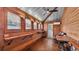 Living room with wooden walls, lots of natural light, and wood floors at 520 E Stanford St, Bartow, FL 33830