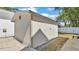 Storage shed in backyard with double-door entry at 520 E Stanford St, Bartow, FL 33830