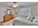 Inviting bedroom with plantation shutters, and a soft blue color palette at 7929 Chase Rd, Lakeland, FL 33810