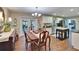 Open concept dining area adjacent to kitchen, featuring french doors to outdoor area at 7929 Chase Rd, Lakeland, FL 33810