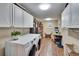 Well-organized laundry room with washer, dryer, and ample storage space at 7929 Chase Rd, Lakeland, FL 33810