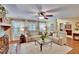 Bright living room with comfortable seating and a glass coffee table at 7929 Chase Rd, Lakeland, FL 33810