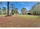 Vast lot featuring the home and a detached garage offering ample outdoor space and privacy at 7929 Chase Rd, Lakeland, FL 33810