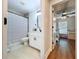 Bathroom featuring tile floors, shower with curtain, and a white vanity at 1040 Timbers Dr, Fort Meade, FL 33841