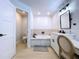 Bathroom features vanity, a built-in tub, and tile flooring at 1040 Timbers Dr, Fort Meade, FL 33841