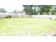 Expansive backyard with a privacy fence, ideal for outdoor activities and relaxation at 112 Bishop St, Auburndale, FL 33823