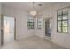 Sunny dining area with tile floors and outdoor access to the exterior at 1131 Country Oaks Blvd, Lake Wales, FL 33898
