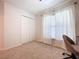 Bright bedroom with large window and closet, creating a serene and comfortable living space at 1205 Third Ct, Eagle Lake, FL 33839