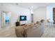Open-concept living room boasting vaulted ceilings and modern decor at 1205 Third Ct, Eagle Lake, FL 33839