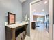 A well-organized mud room with direct access to the kitchen enhances functionality and convenience at 1205 Third Ct, Eagle Lake, FL 33839