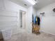 Walk-in closet with wire shelving, carpet flooring, and an open doorway at 1205 Third Ct, Eagle Lake, FL 33839