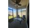 Screened lanai with ceiling fan and outdoor seating, perfect for relaxation at 1414 Fox Squirrel Dr, Davenport, FL 33897